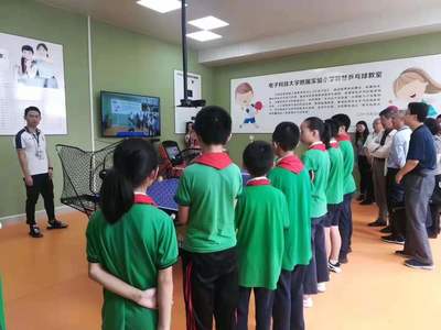 智慧体育融合创新——国务院参事调研智慧乒乓球教室教学设备研发成果